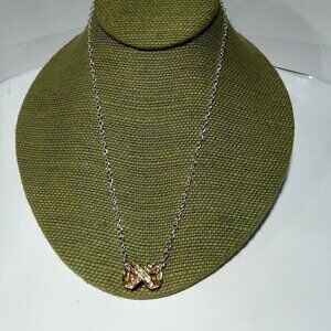 Women`s silver/gold tone bow crystal necklace.